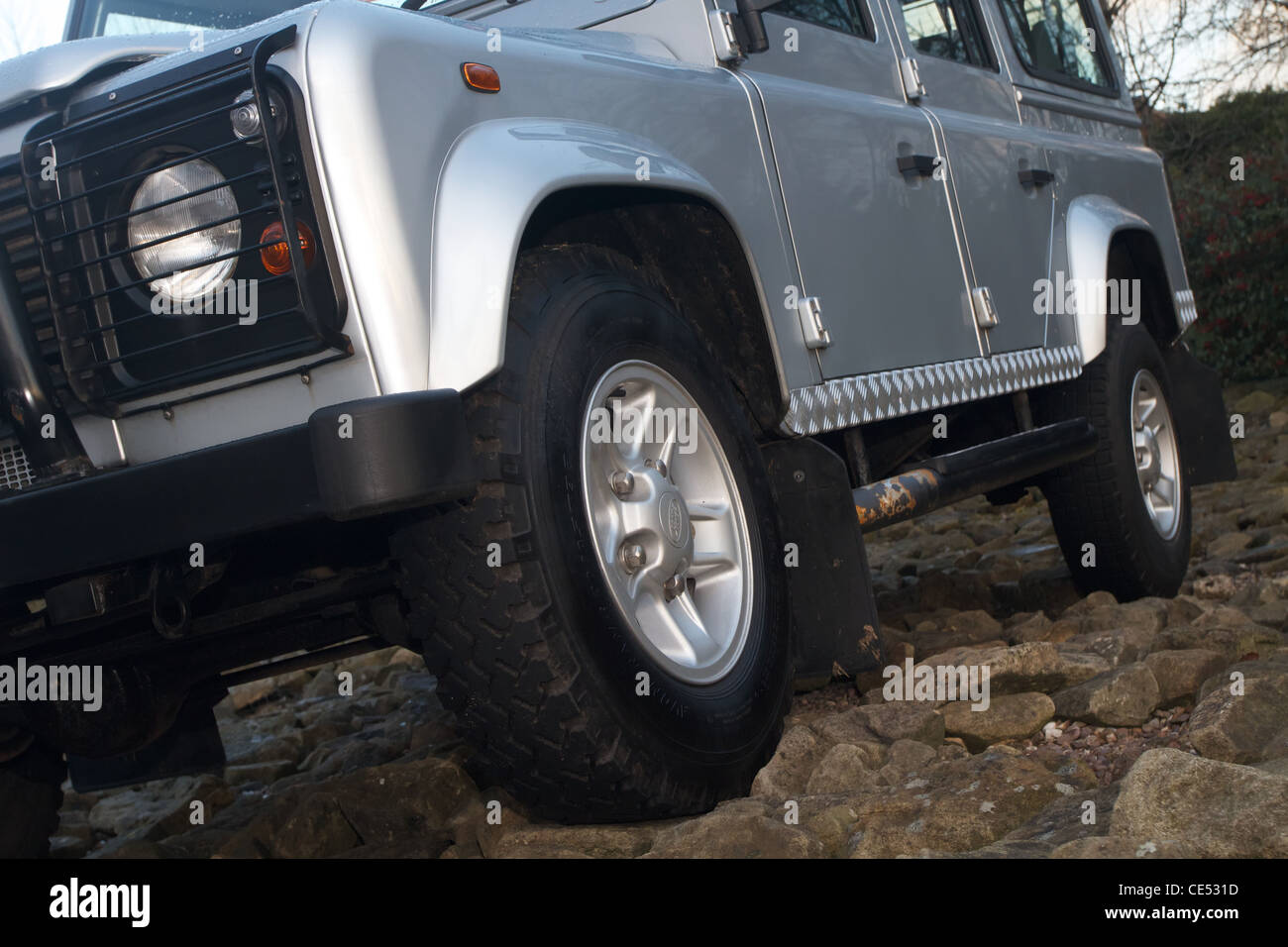 Land Rover Defender on rocky terrain Stock Photo