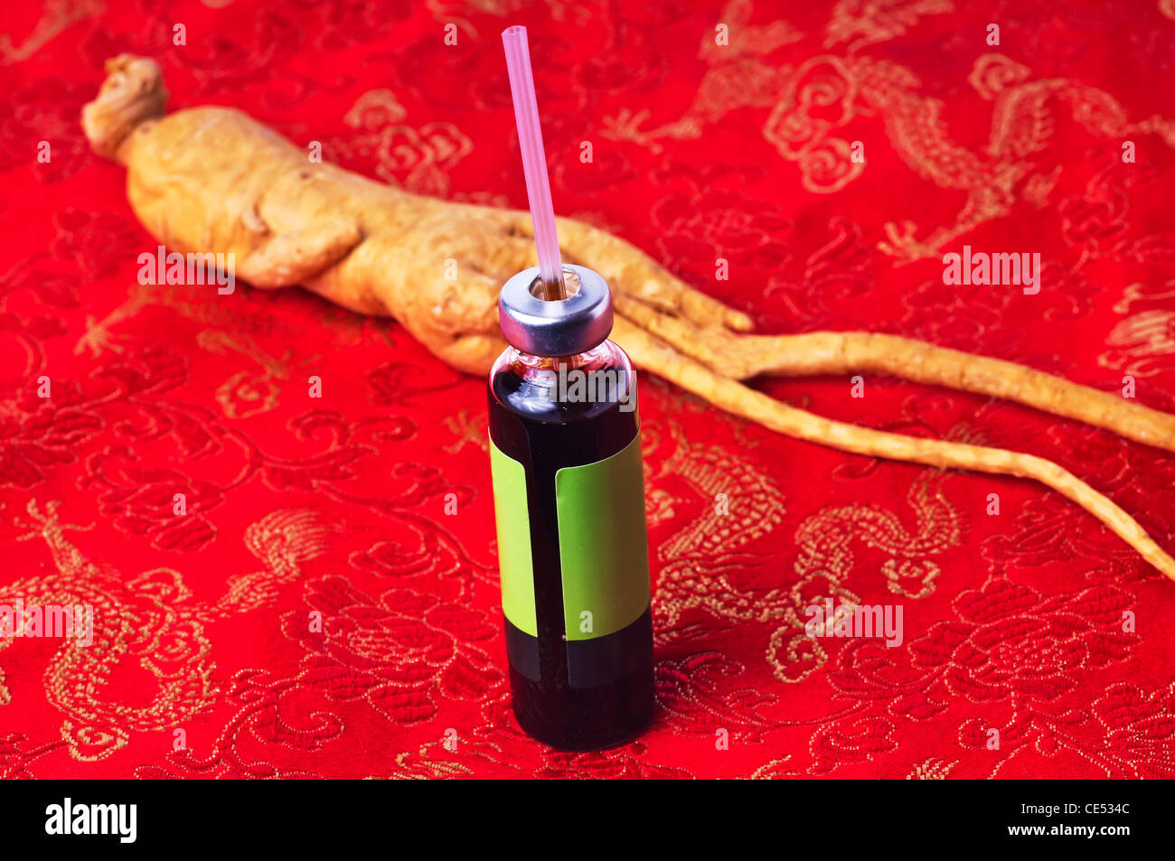 ginseng bottle with ginseng root Stock Photo Alamy