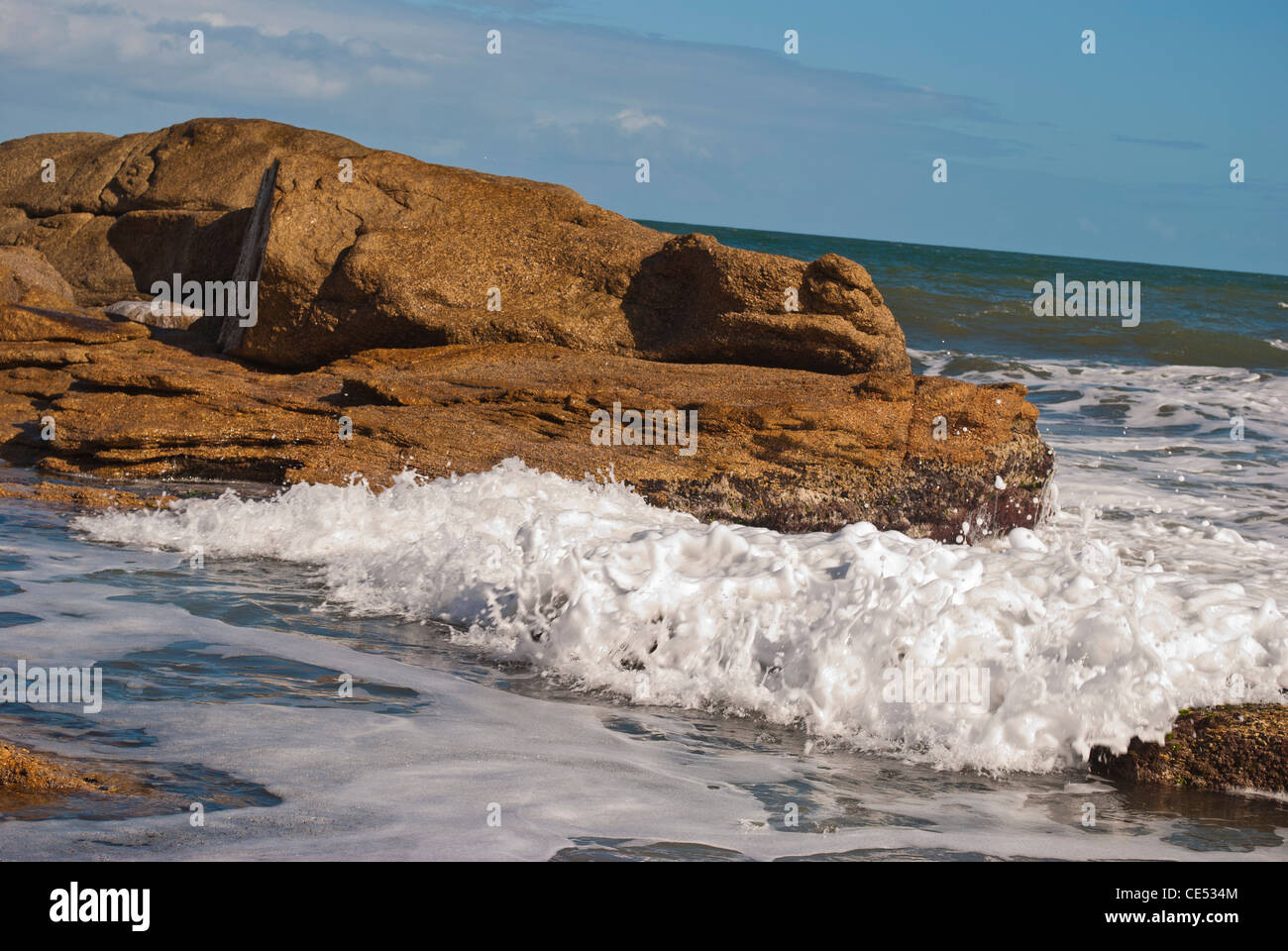 foam of sea on rocks, Punta del Este, Uruguay. Stock Photo