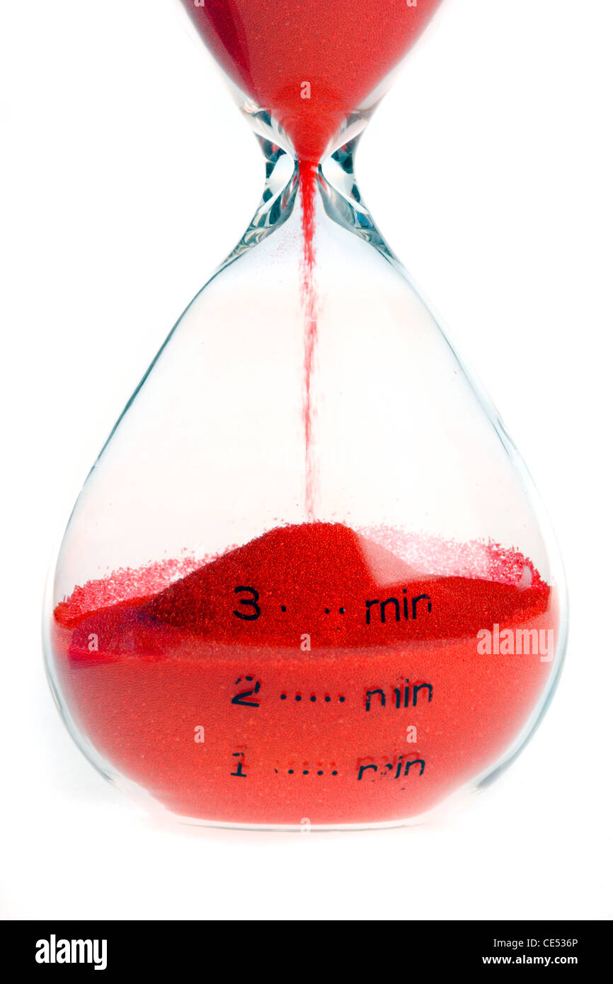 Hourglass, analog timing through slowly running sand. Stock Photo