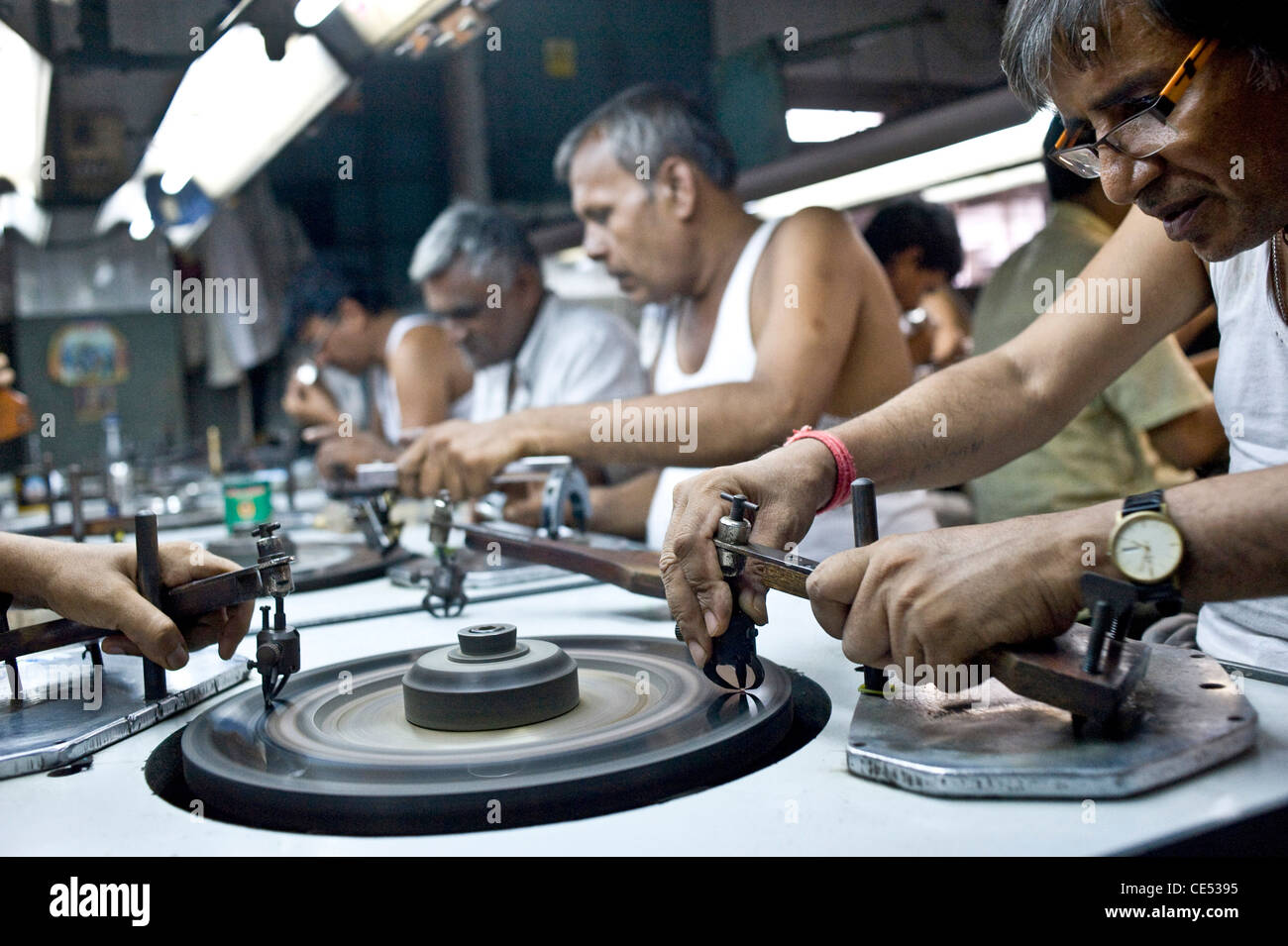 Diamond polishing . Table area and workers where the table [top] Stock