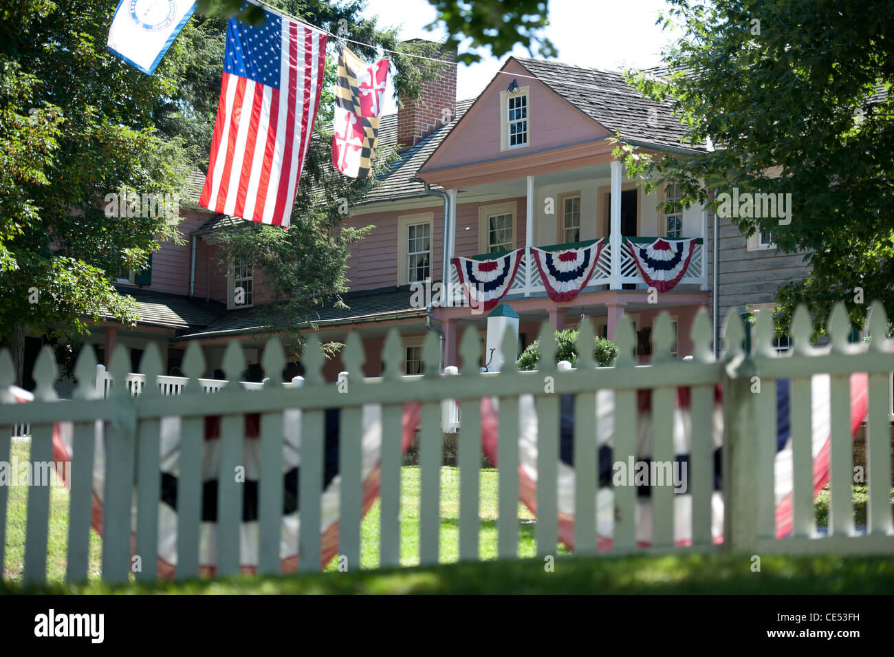 Flags flown at home near Civil War encampment of reenactors at Union
