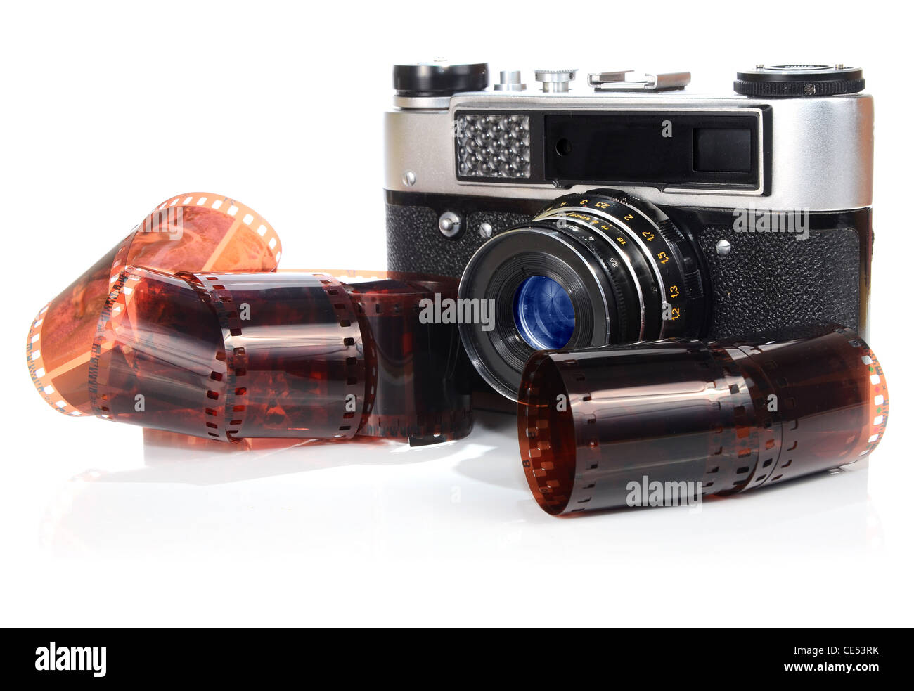 old retro photo camera and film isolated on white background Stock ...