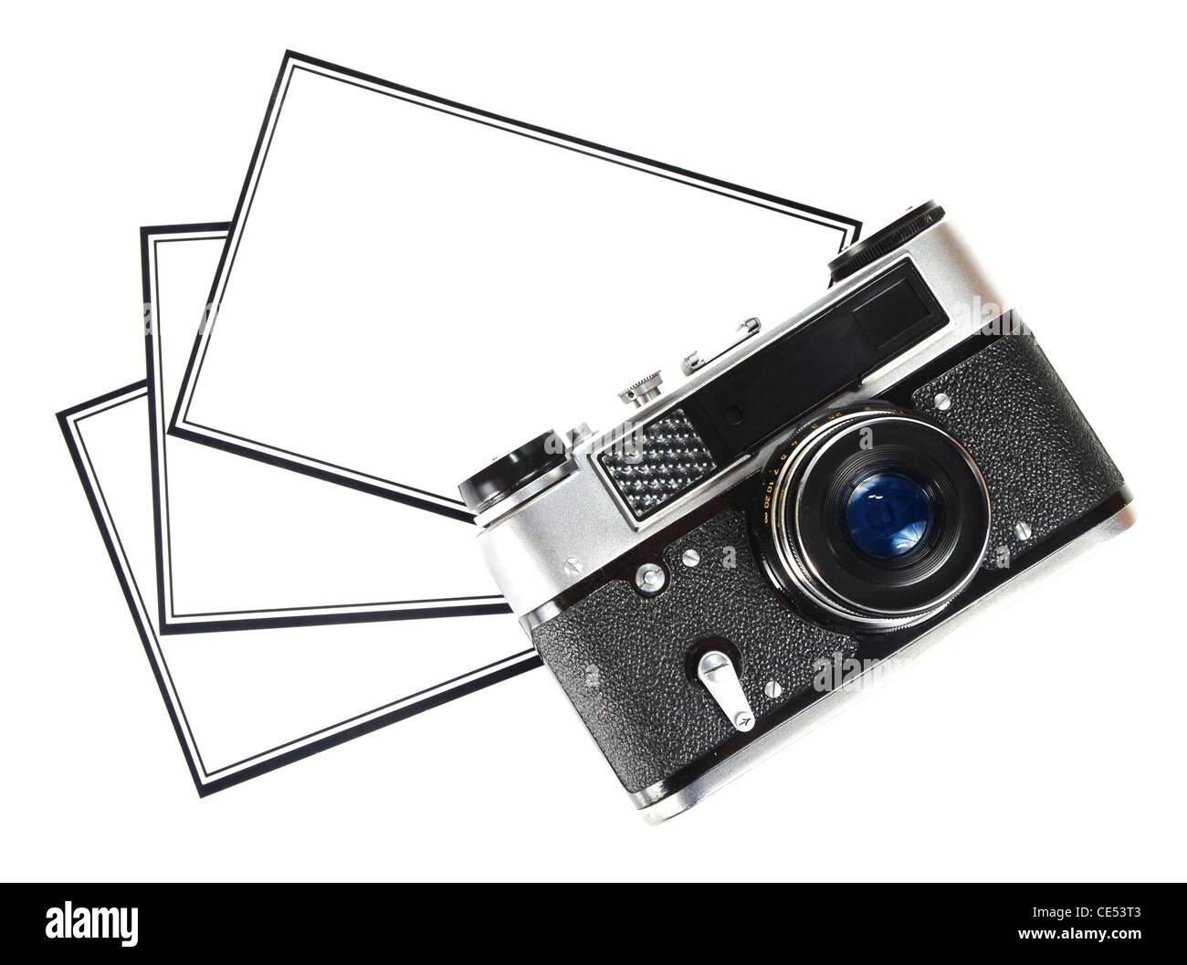 old retro photo camera and blank photo isolated on white background ...