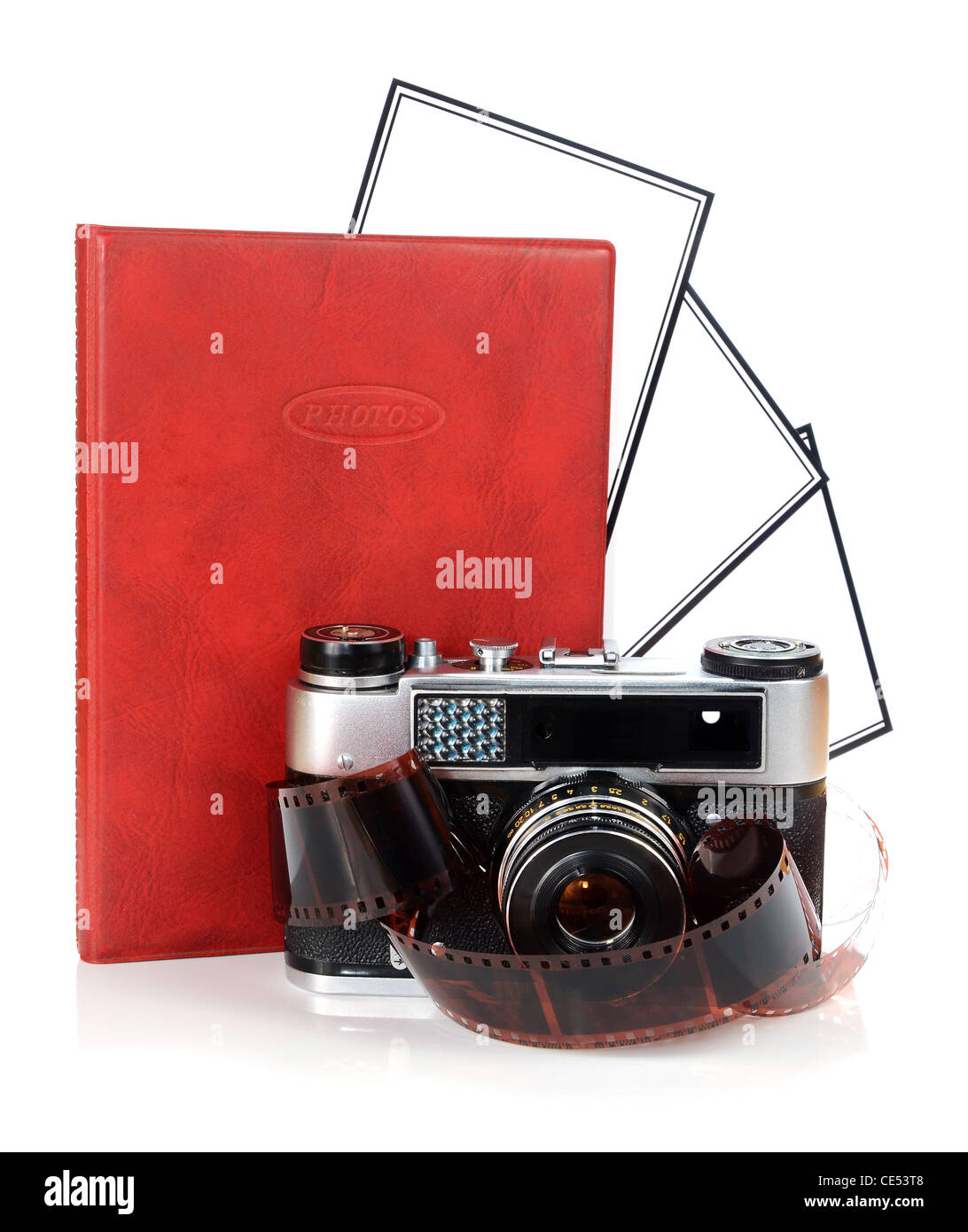 old retro photo camera and blank photo isolated on white background ...