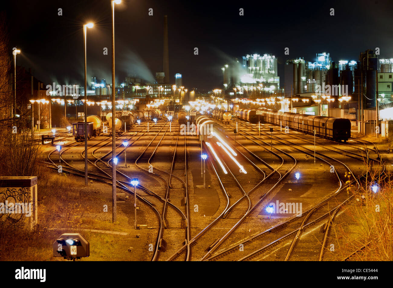Railway tankers being shunted at night, Evonik chemical factory, Wesseling, Cologne, North Rhine-Westphalia, Germany. Stock Photo