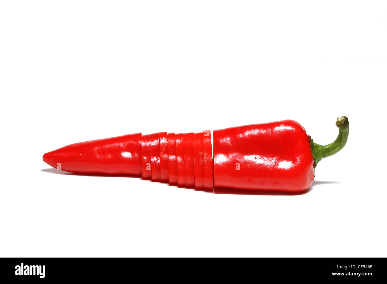 Sliced red pepper over white background Stock Photo