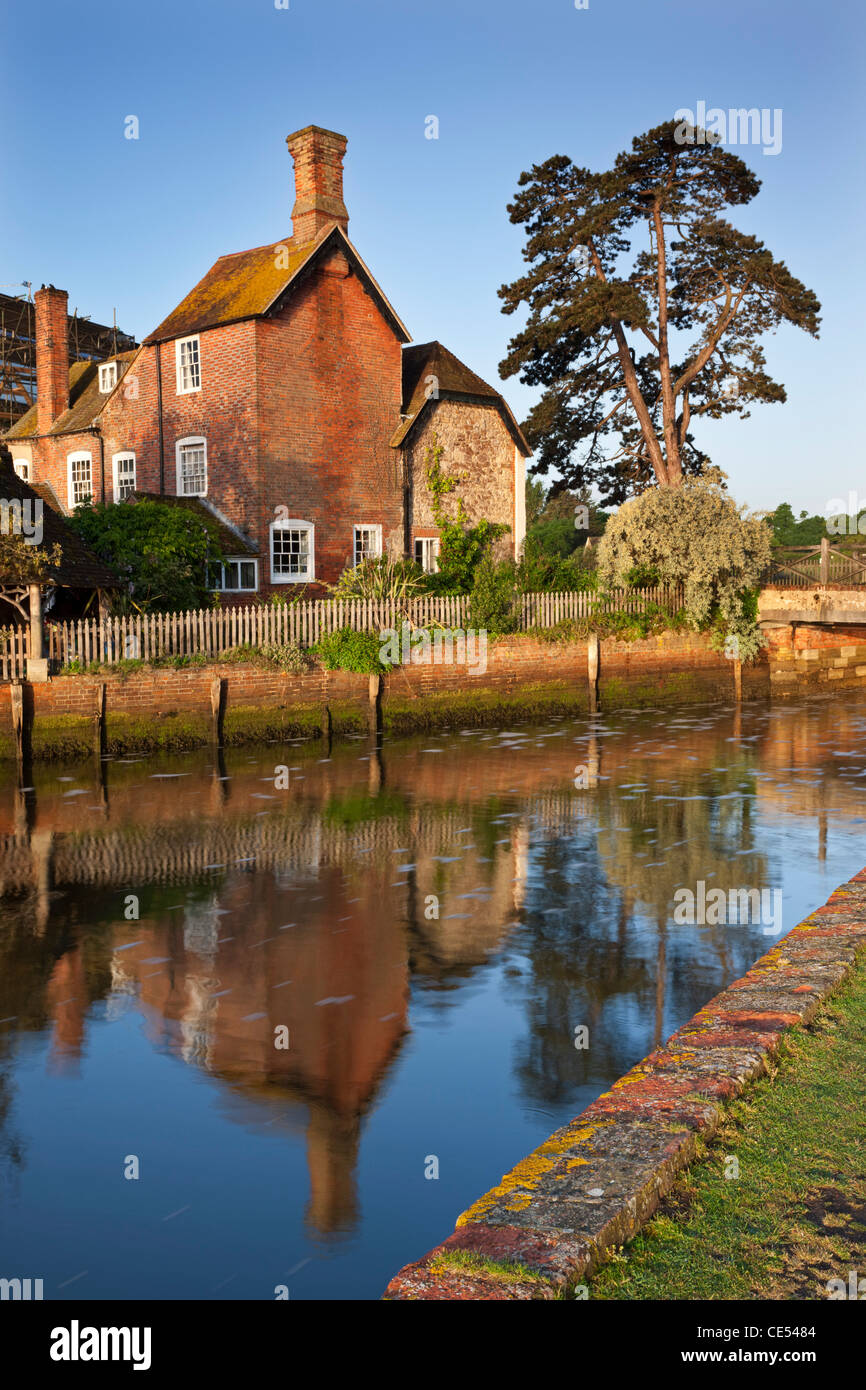 The 16th Century Mill House beside Beaulieu River, New Forest, Hampshire, England. Spring (May) 2011. Stock Photo