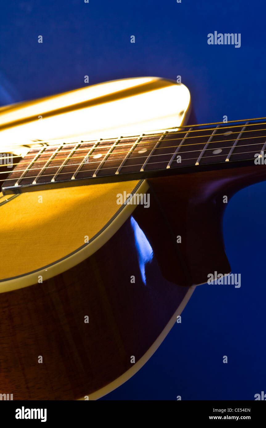 Acoustic guitar close ups in studio. Stock Photo