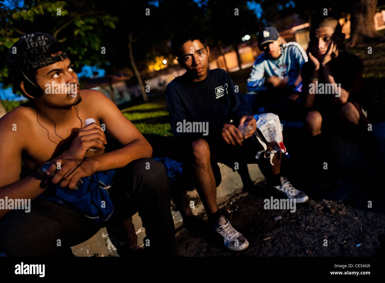 Salvadorean teenagers live on the street and sniff glue, San Salvador, El Salvador. Stock Photo