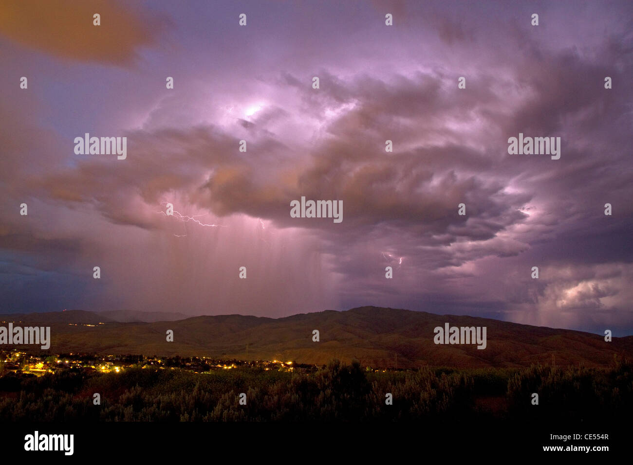 Lightning strikes during a thunderstorm on the first day of summer in ...