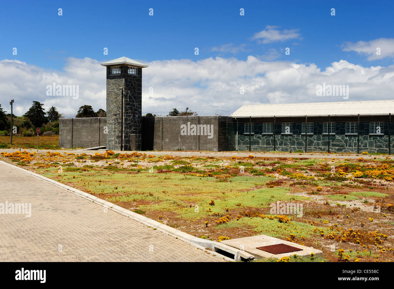 Cell block and guard tower on Robben Island off the coast of Cape Town, Western Cape, South Africa Stock Photo