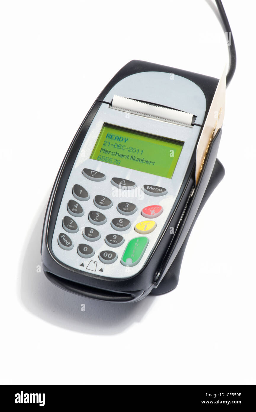 A credit card being swiped through a credit card machine Stock Photo