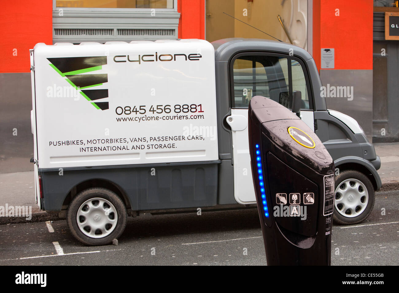A Mega van electric vehicle in Westminster, London, UK, with an electric vehicle charging station. Stock Photo