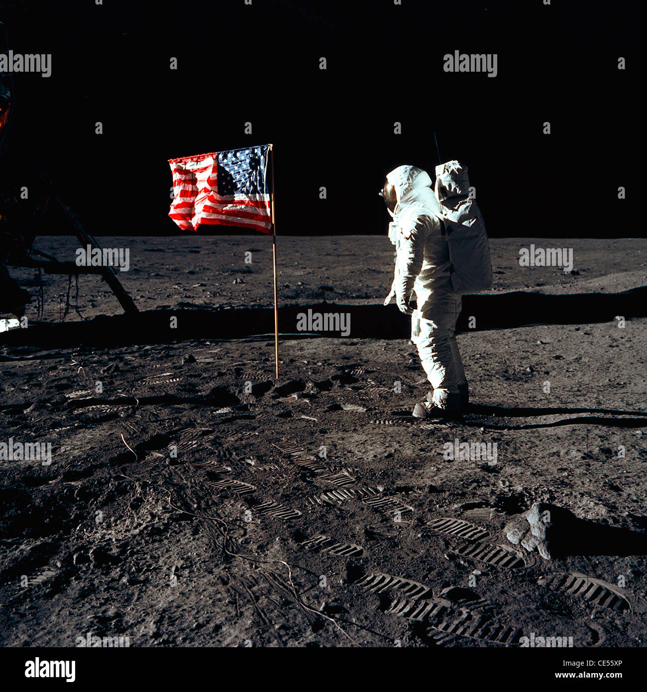 Buzz Aldrin, the pilot of the first lunar landing mission, with an American flag during Apollo 11 on the moon Stock Photo