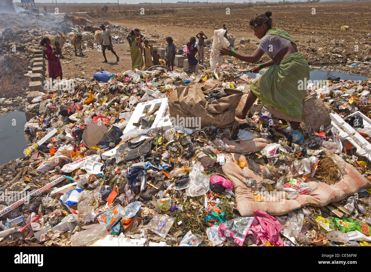 A family of rag pickers pictured on a dump in Virar situated on the