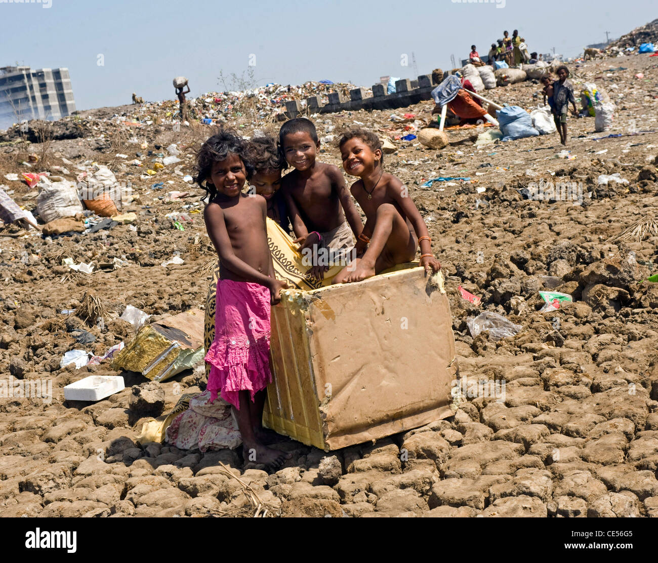 A family of rag pickers pictured on a dump in Virar situated on the