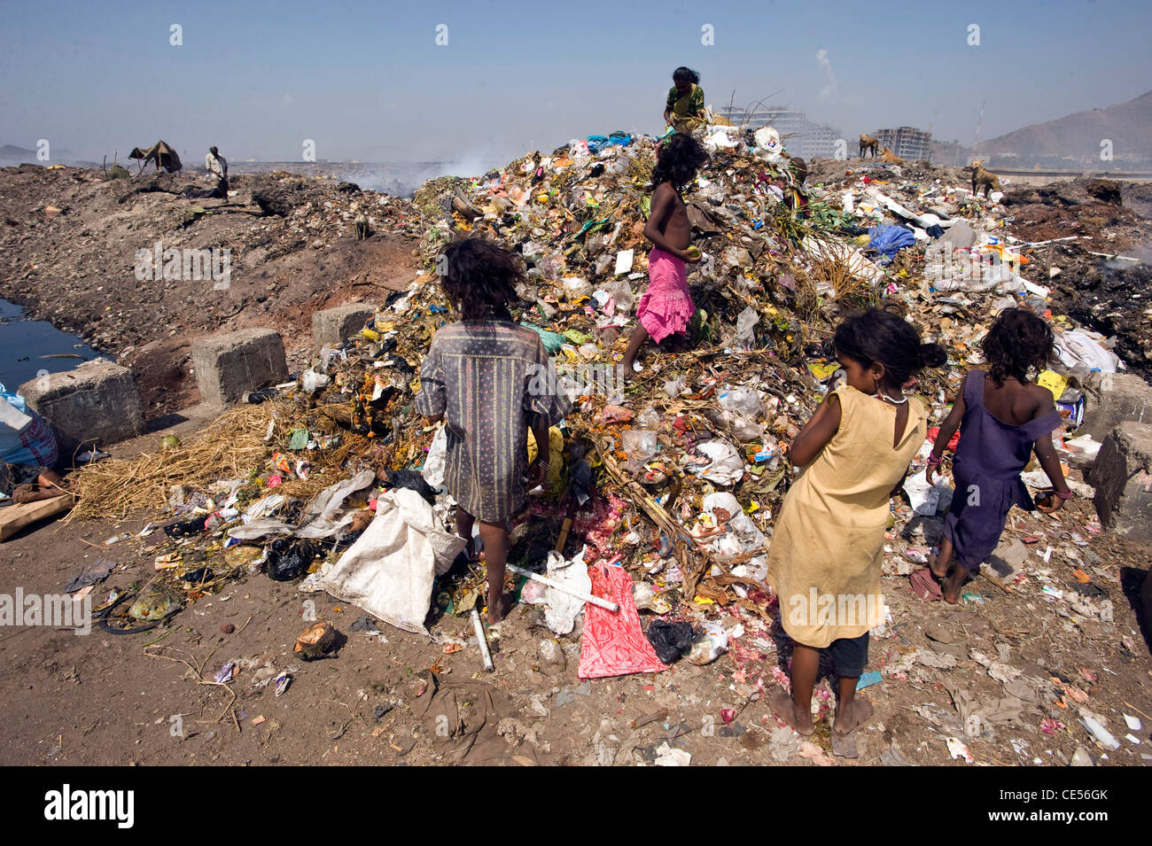 A family of rag pickers pictured on a dump in Virar situated on the