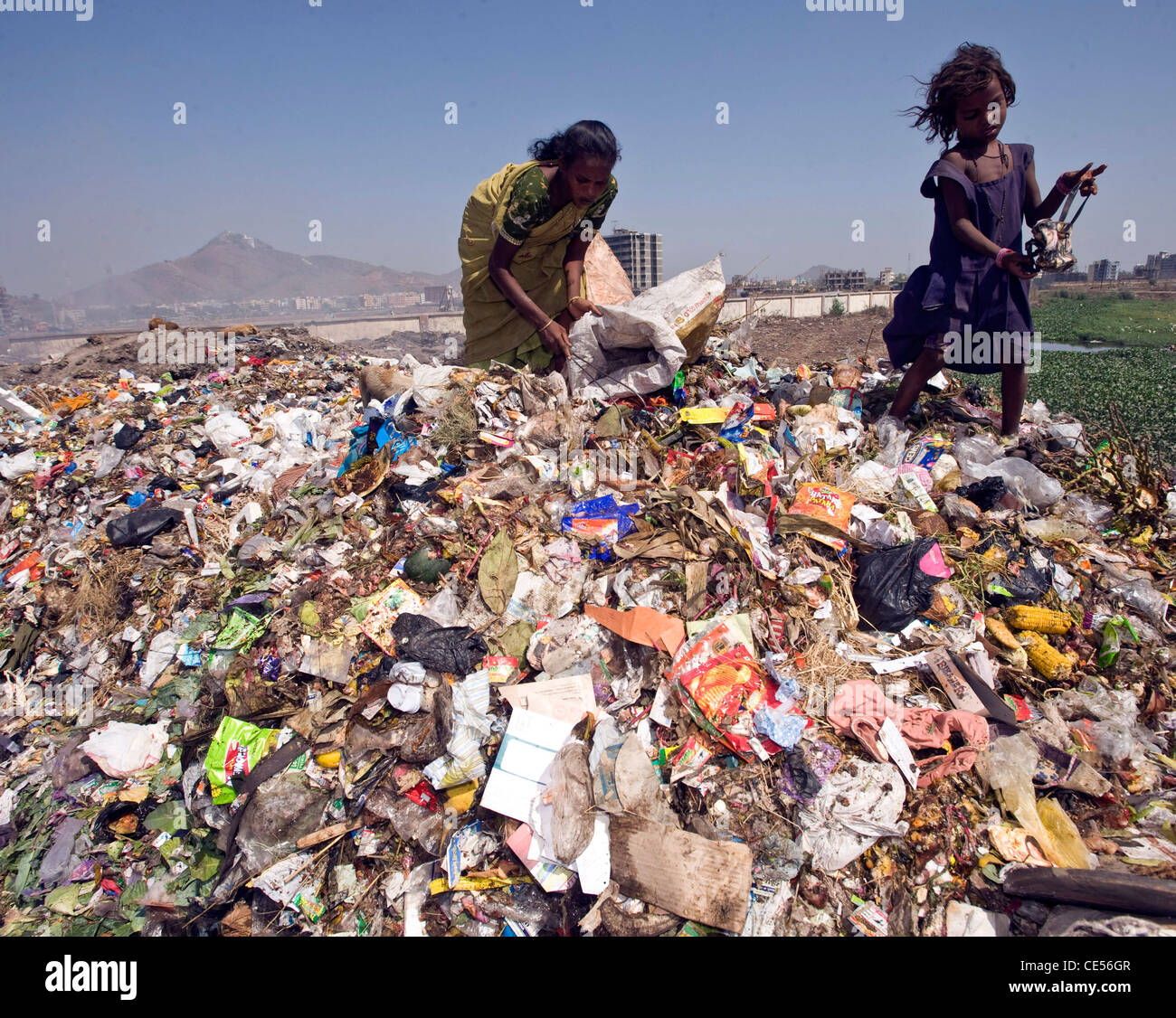 A family of rag pickers pictured on a dump in Virar situated on the