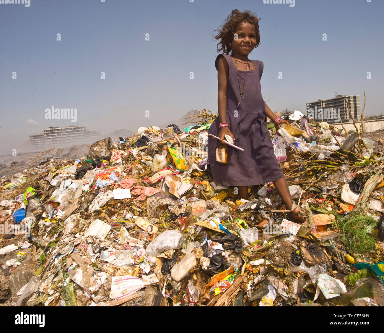 A family of rag pickers pictured on a dump in Virar situated on the