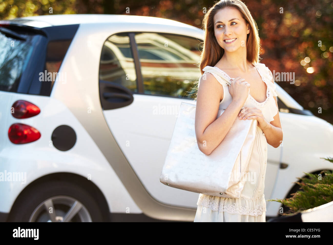 Attractive girl with bag Stock Photo Alamy