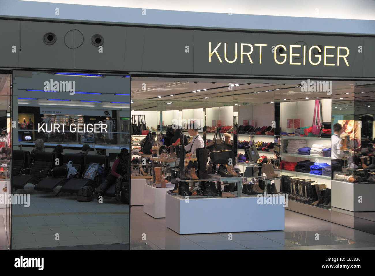 Shoppers and travelers at the Kurt Geiger Fashion Footwear Shoes Boutique  shop store in Gatwick Airport, Sussex, England Stock Photo - Alamy