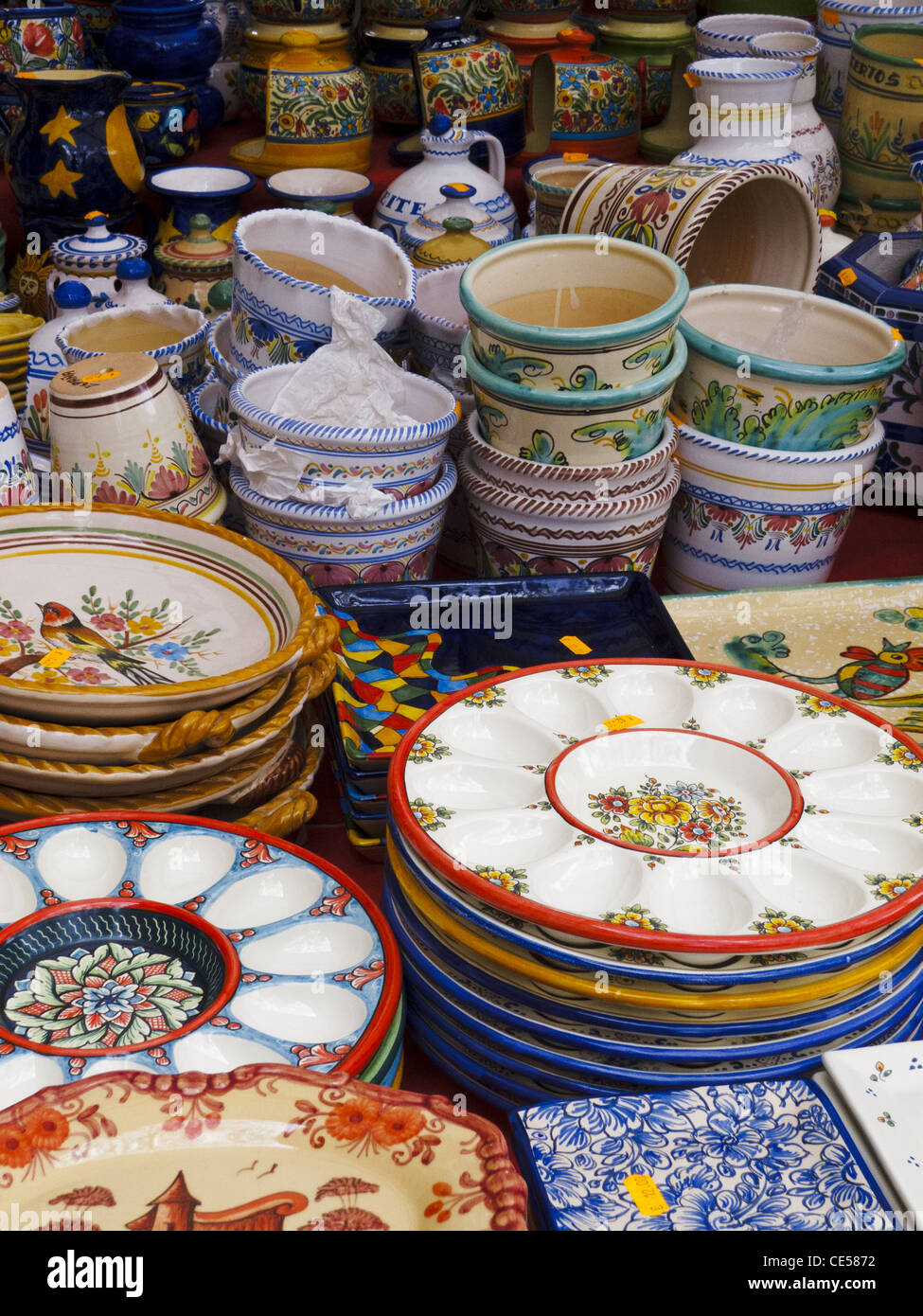 Handpainted ceramic plates and bowls at El Rastro market, Madrid