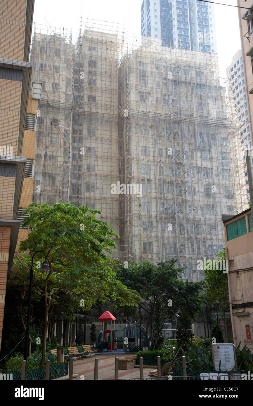 bamboo scaffolding and screens around building in smithfield kennedy town hong kong hksar china asia Stock Photo