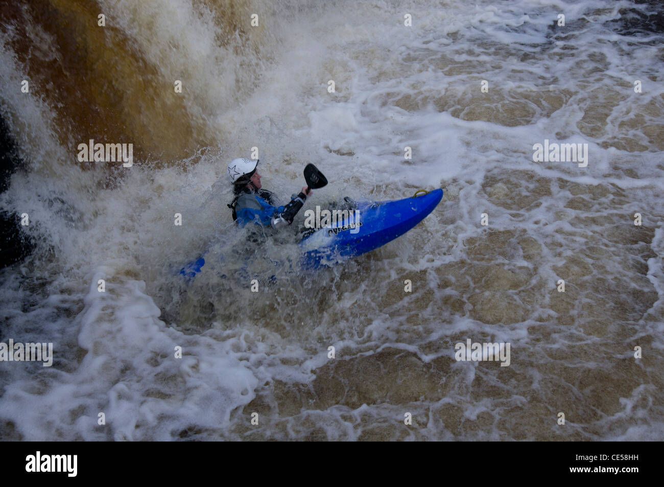 Kayaker on a waterfall in Teesdale, England Stock Photo