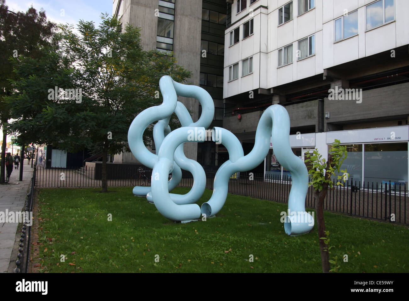 Waterline, a tubular blue steel sculpture by artist Oliver Barratt in Catford, London Stock