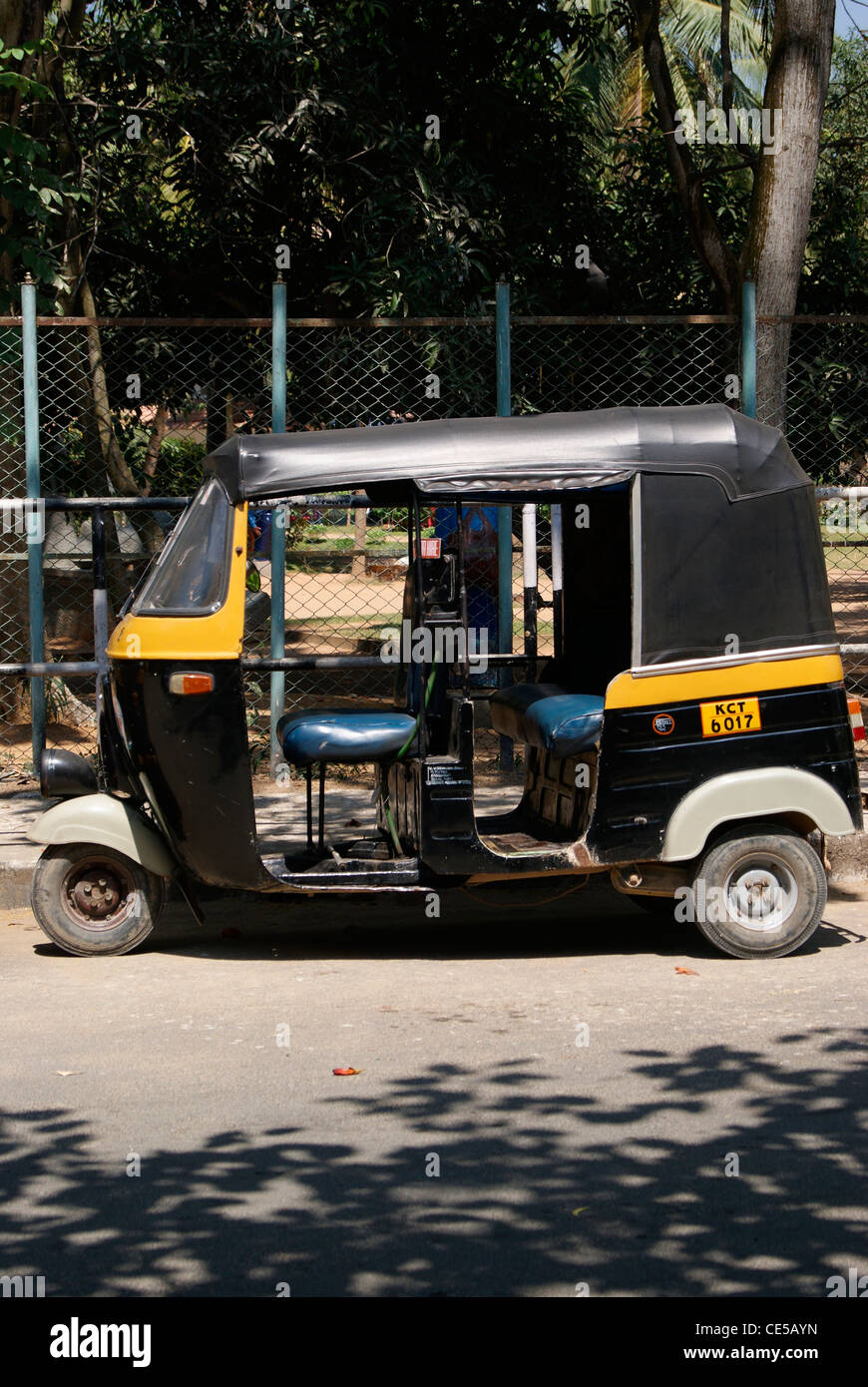 Kerala Auto rickshaw ( Tuk Tuk ) (Auto taxi) parked in side of Road Stock Photo