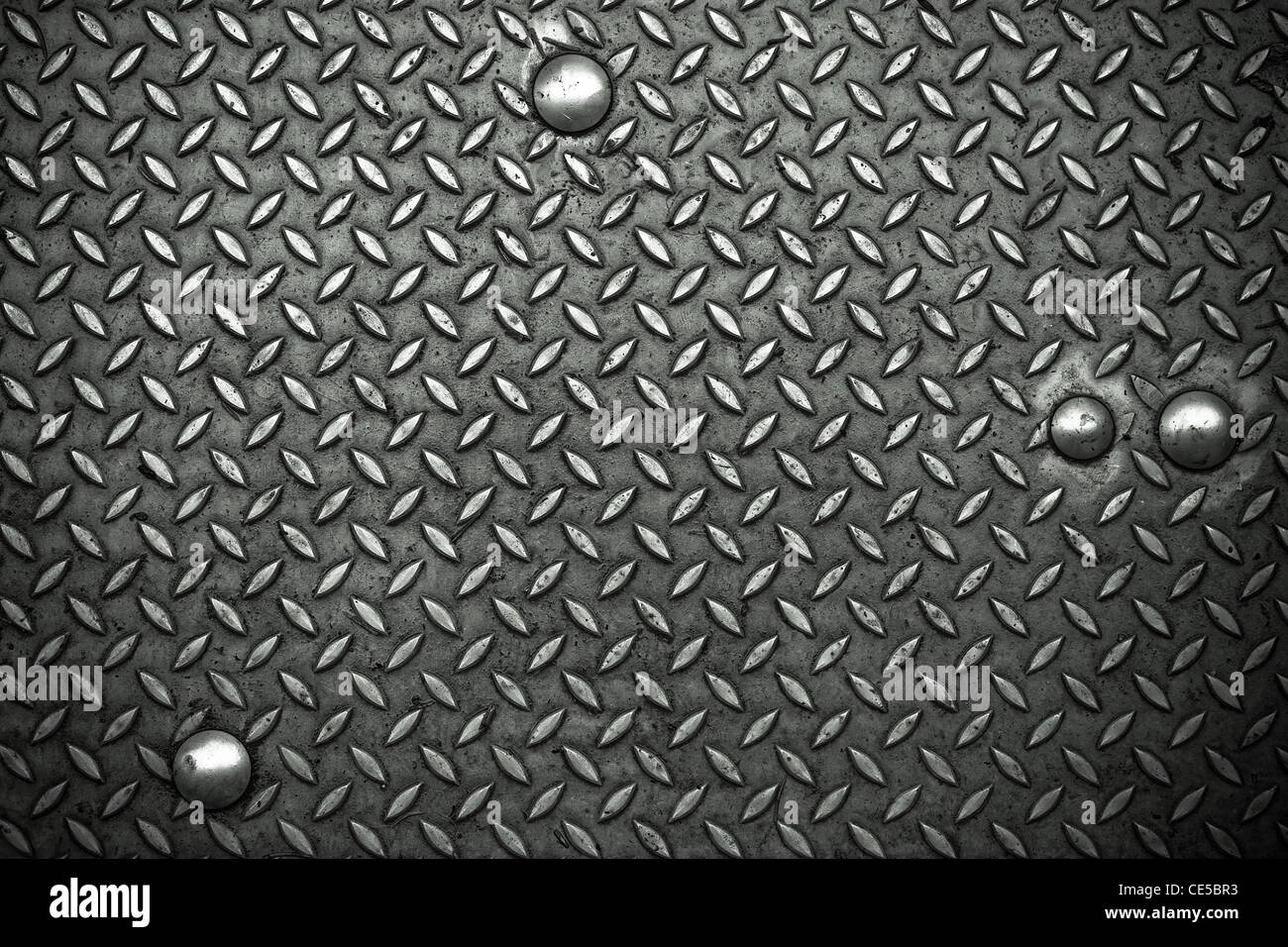 Metal surface with rivets as a background motive Stock Photo - Alamy