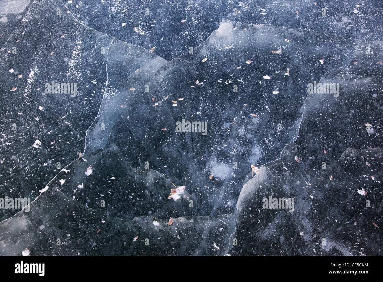 Cracked ice on a winter lake Stock Photo