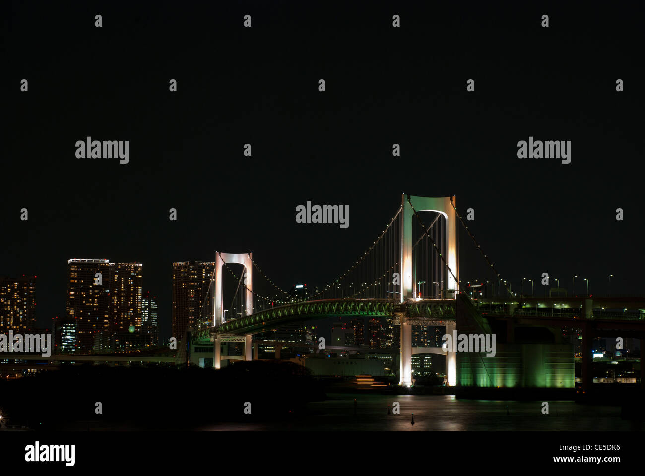 the beautiful night skyline with Rainbow Bridge the famous bridge in Tokyo, Japan . cityscape of tokyo. Stock Photo