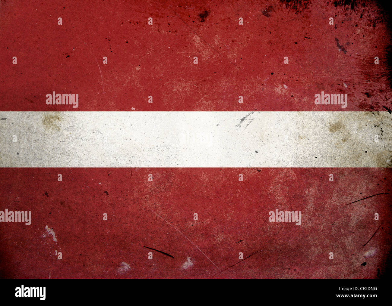 Flag of Latvia on old and vintage grunge texture Stock Photo - Alamy