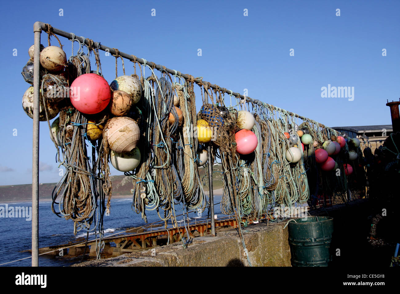 some old lobster pots floats buoys and fishing nets with ropes