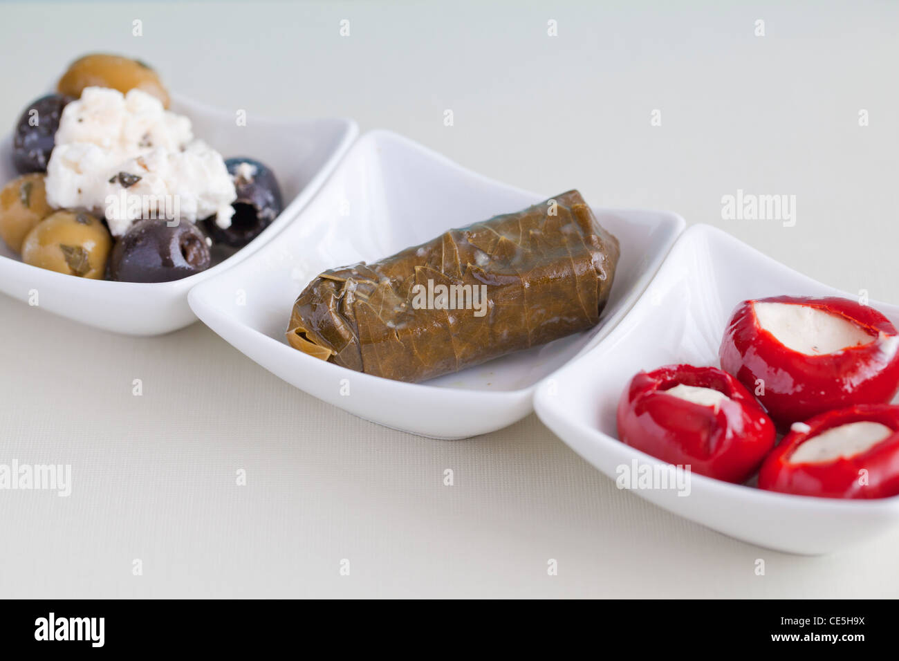 Mezze with olives, feta cheese, stuffed vine leaves & stuffed peppers