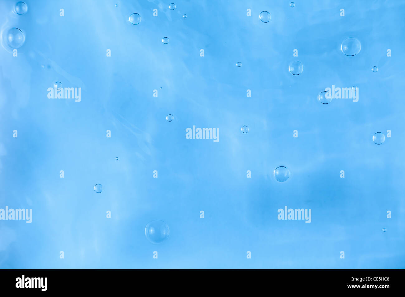 Bubbles in Blue Calm Water Stock Photo - Alamy