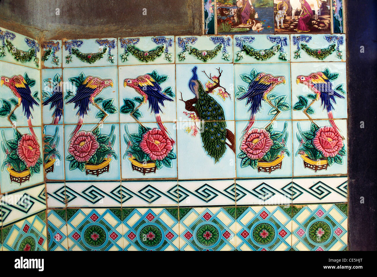 Birds on glazed tiles in Nattukkottai Chettiar home ; Chettinad ; Tamil Nadu ; India Stock Photo