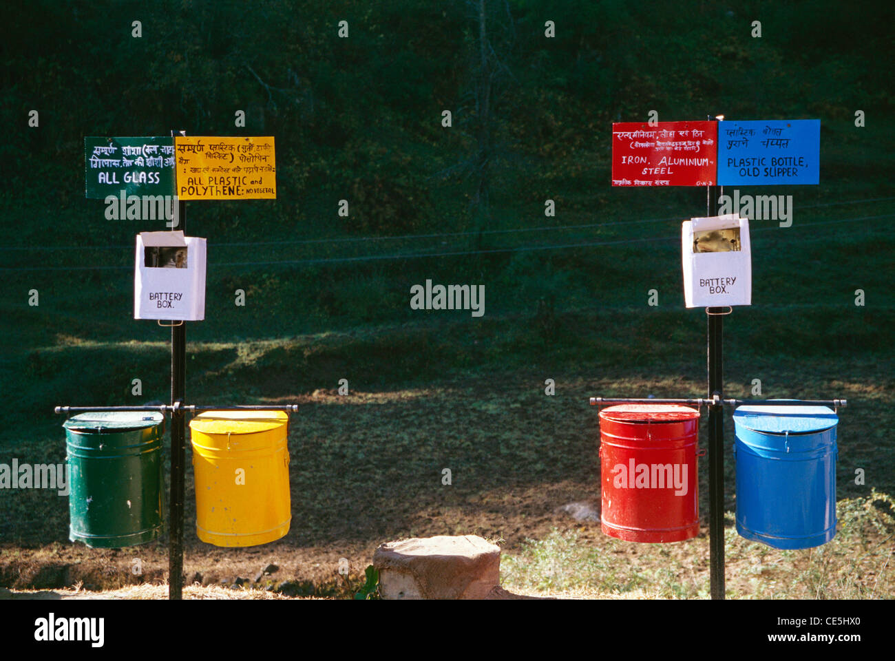 different colour dustbins green yellow red blue to segregate many waste garbage Stock Photo Alamy