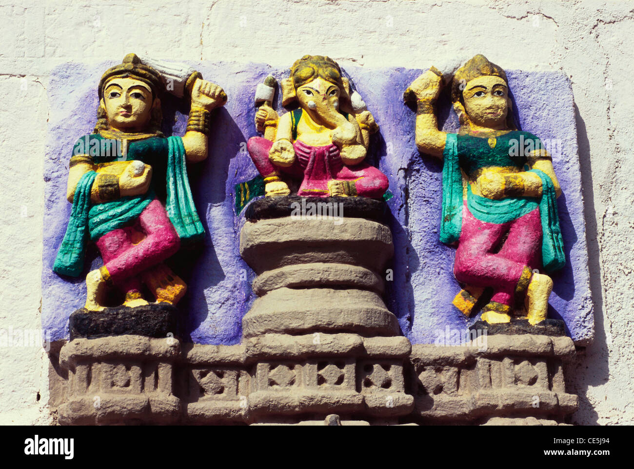 sculpture of Lord Ganesha ganpati with wives Riddhi and Siddhi ; Sayla ; Gujarat ; India Stock Photo