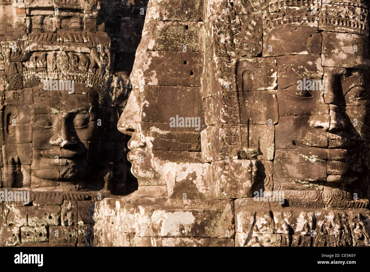 The giant stone faces at the temple of Bayon in Angkor, Cambodia. Stock Photo