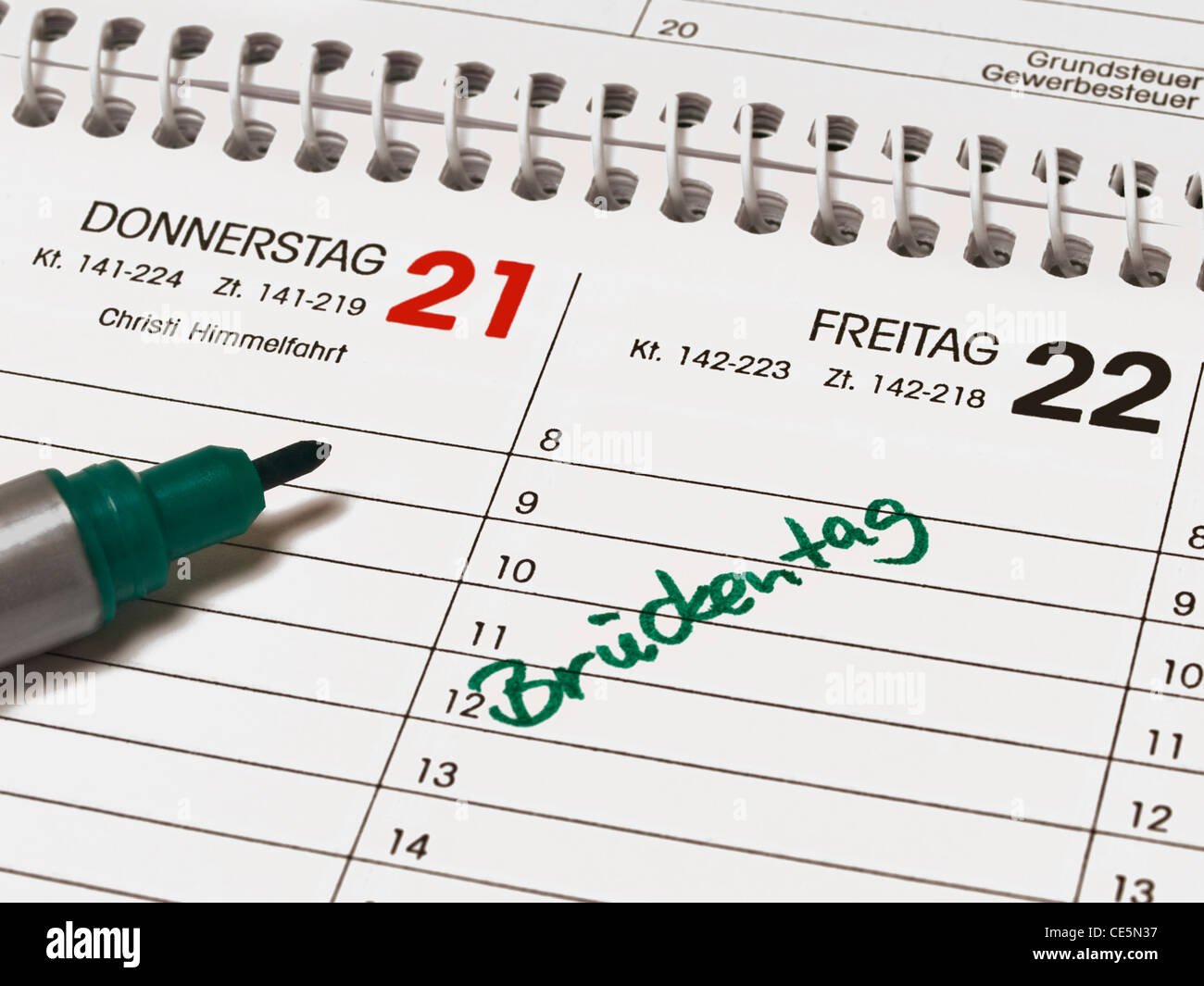 Thursday the 21th, Ascension Day and Friday the 22th. On Friday the item bridging day is in the calendar written in German. Stock Photo