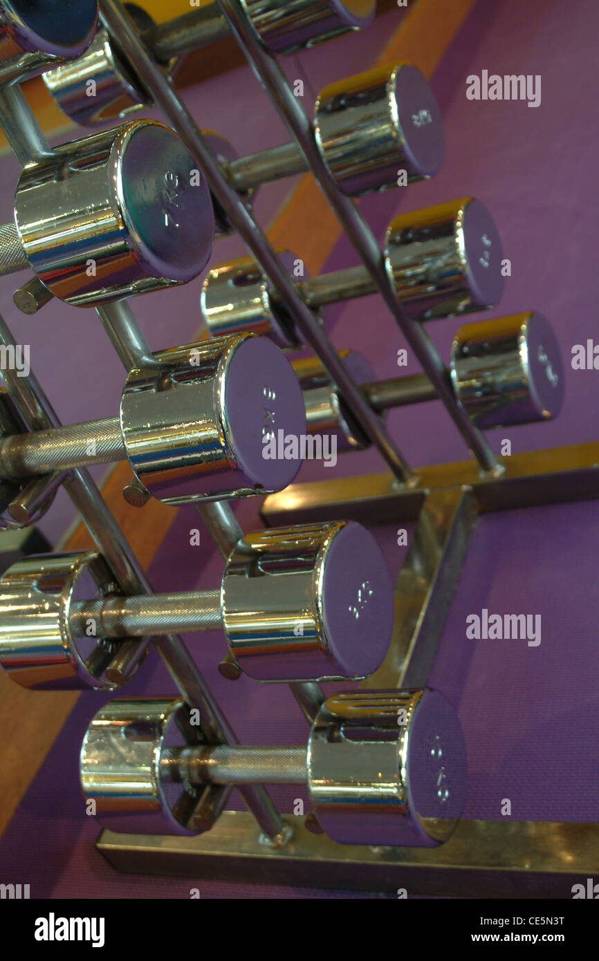Dumbbell weight rack Stock Photo - Alamy
