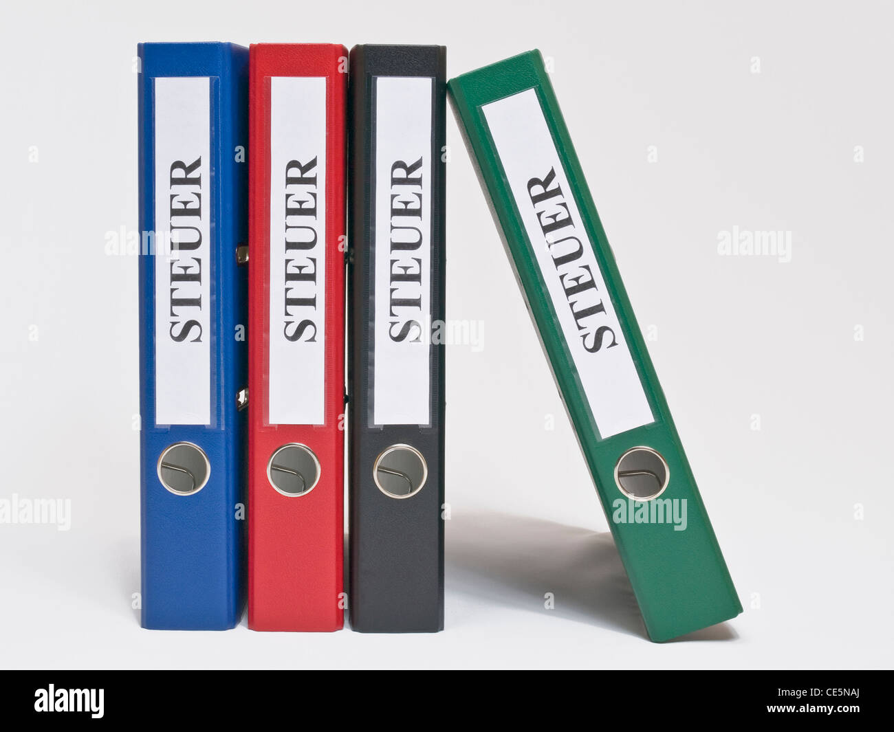 vier bunte, stehende Ordner beschriftet mit "Steuer" | four colored files  upright with the German label "Steuer"(Tax Stock Photo - Alamy