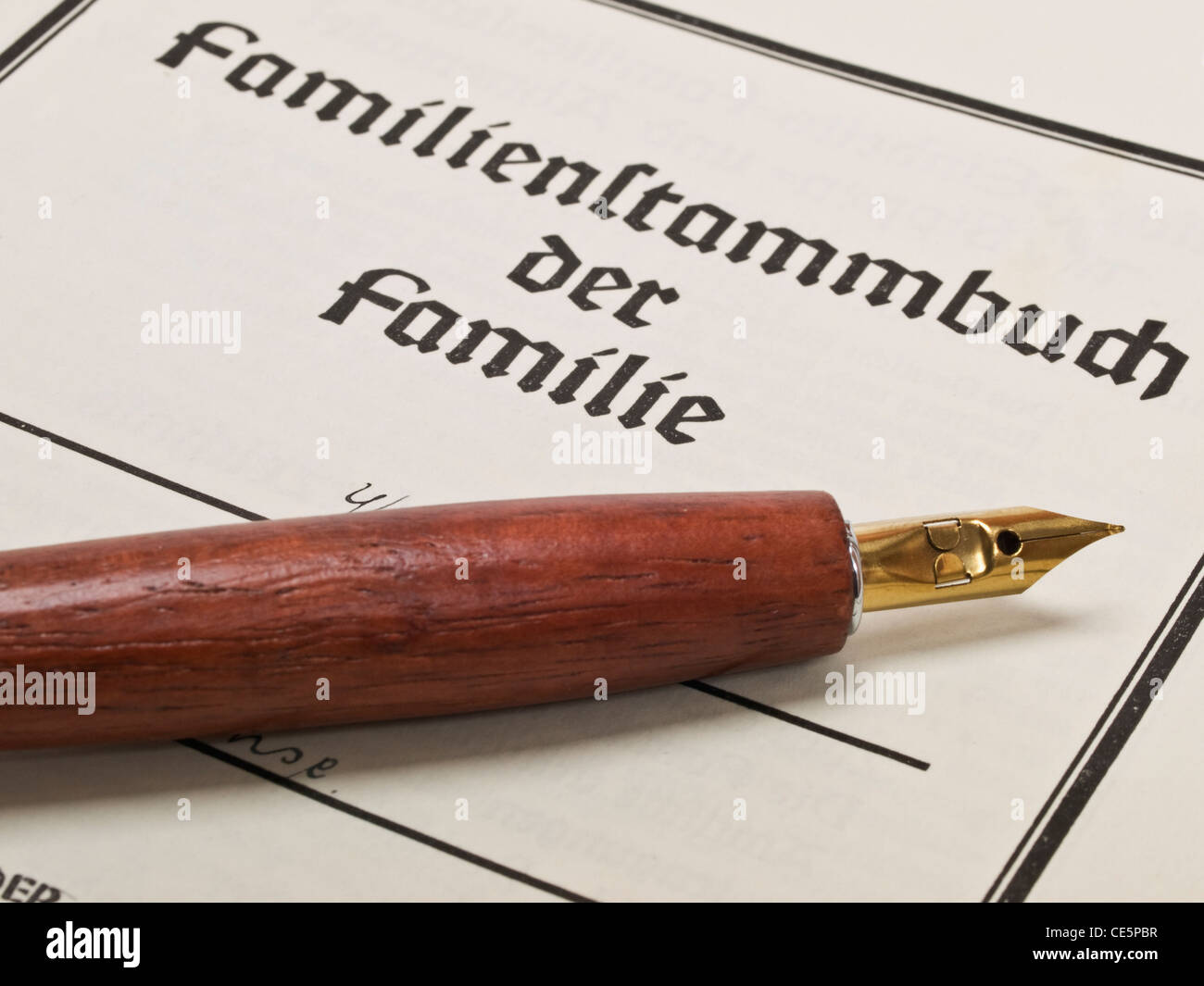 Detail photo of a family register from the year 1938, on it is a pen Stock Photo