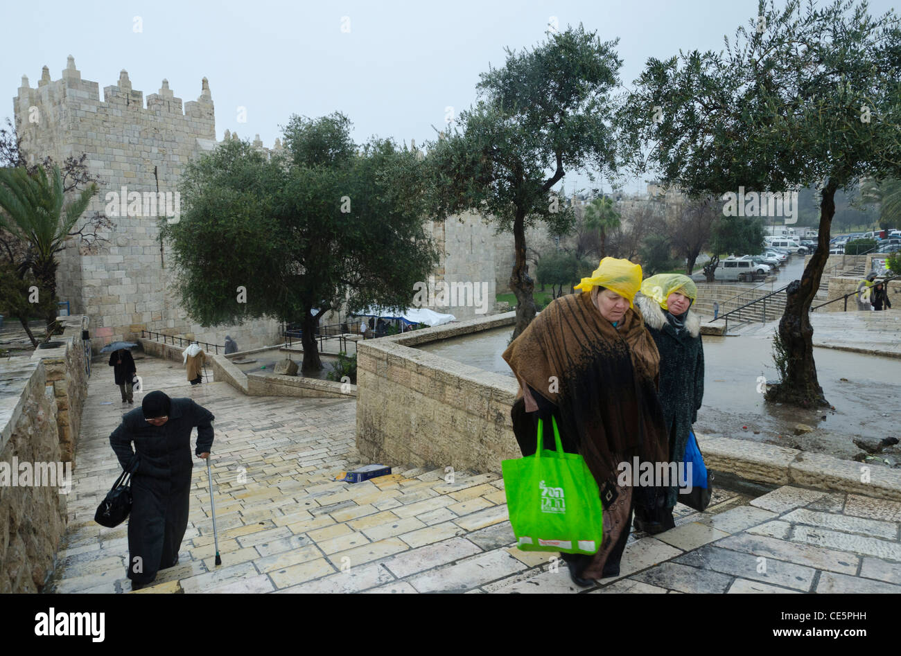 palestinian women in winter weather. Damascus gate. Jerusalem Old City. israel Stock Photo