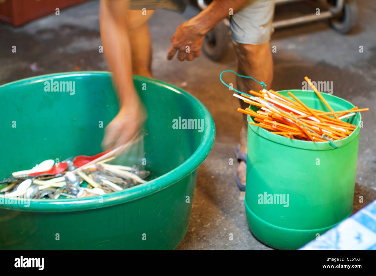 chopsticks dishwasher in penang night market Stock Photo Alamy
