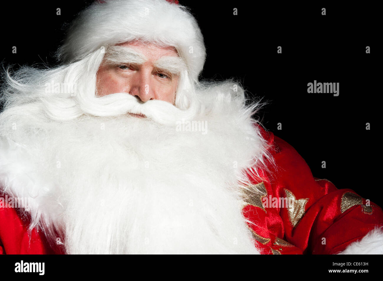 Santa Claus Portrait smiling isolated over a black background Stock ...