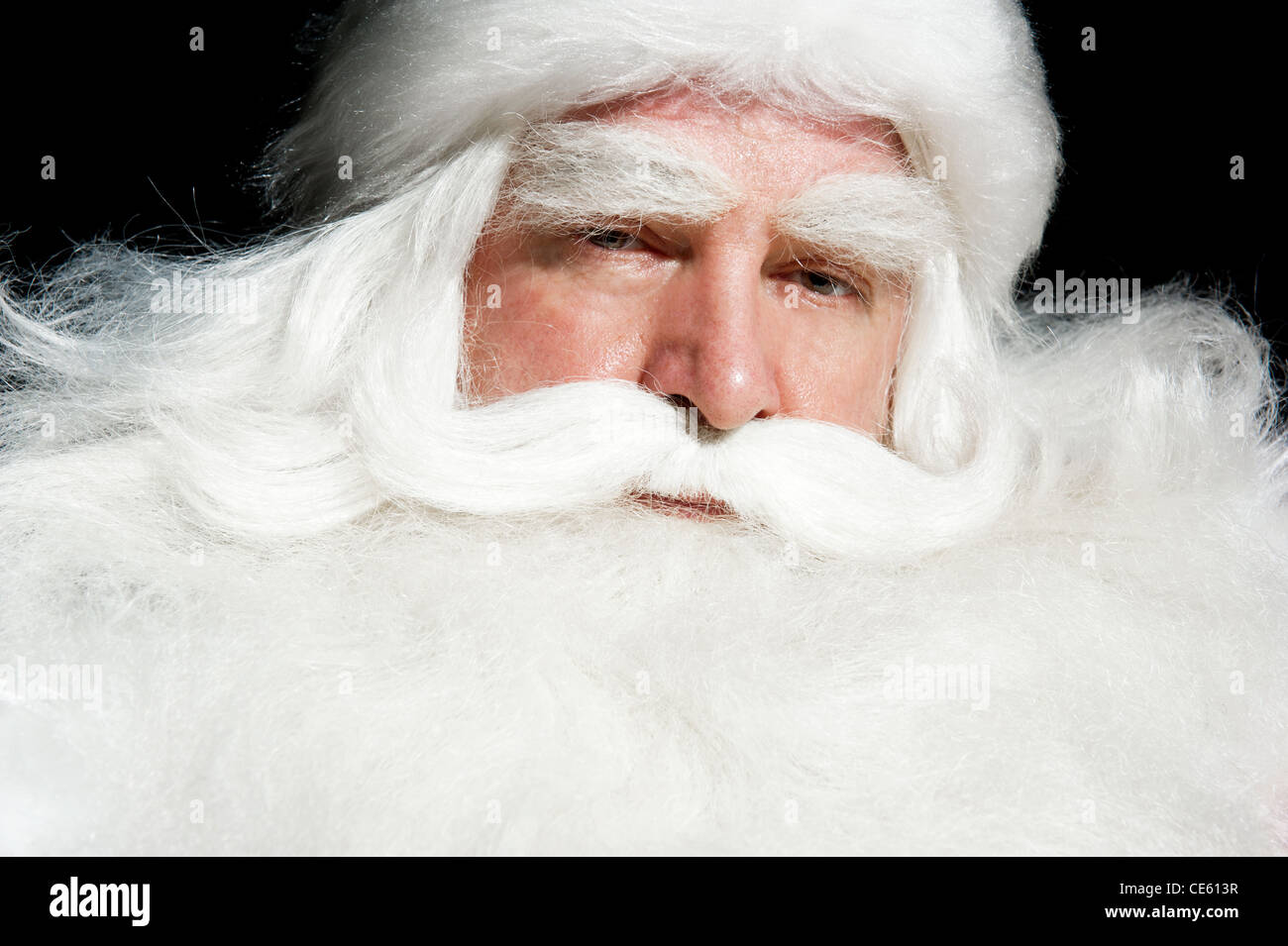 Santa Claus Portrait smiling isolated over a black background Stock ...